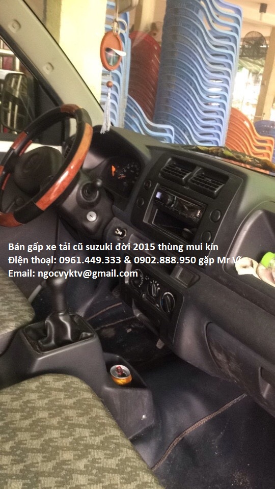 Can ban gap con xe tai cu Suzuki doi 2015 thung mui kin gia thuong luong