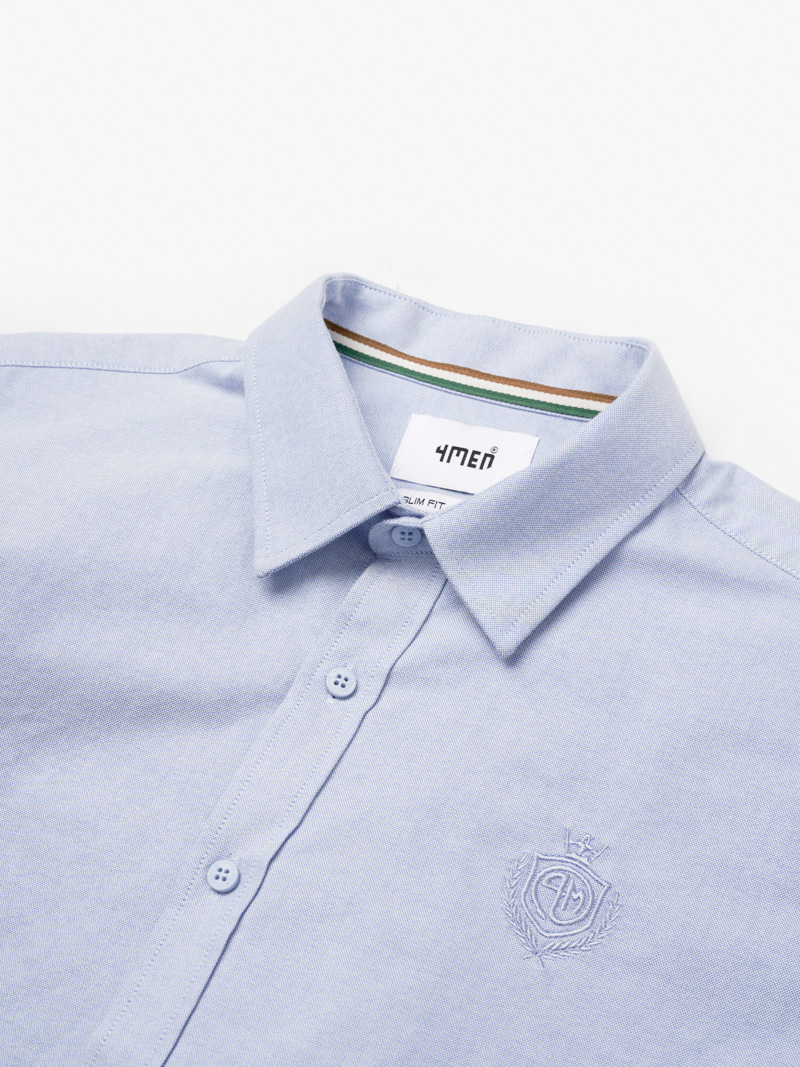 Ao So Mi Oxford Theu Logo Huy Hieu Form Slimfit SM171 Mau Xanh Bien