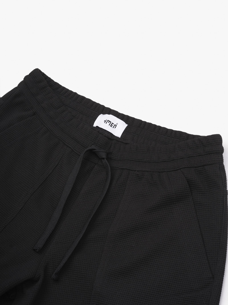 Quan Short Lung Thun Tui Xeo Gan Tag Silicon 4M Form Regular QS064 Mau Den